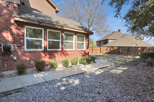 view of home's exterior with a patio