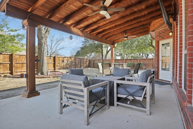 view of patio / terrace featuring ceiling fan