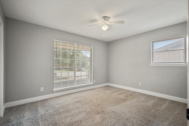 unfurnished room with carpet floors and ceiling fan