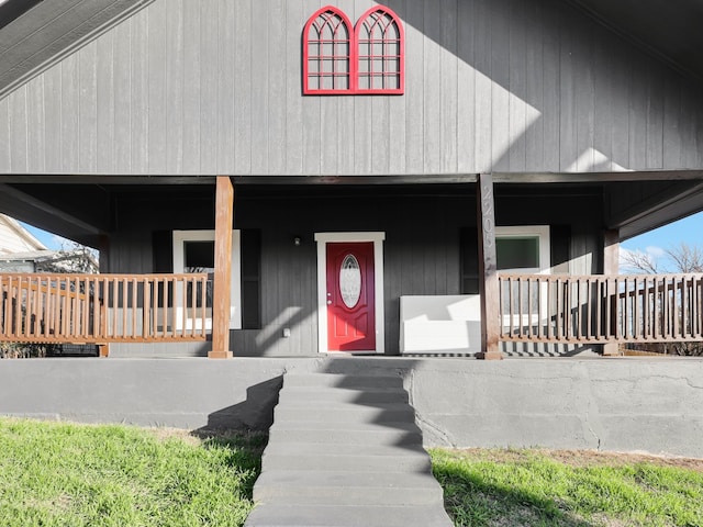 property entrance with a porch