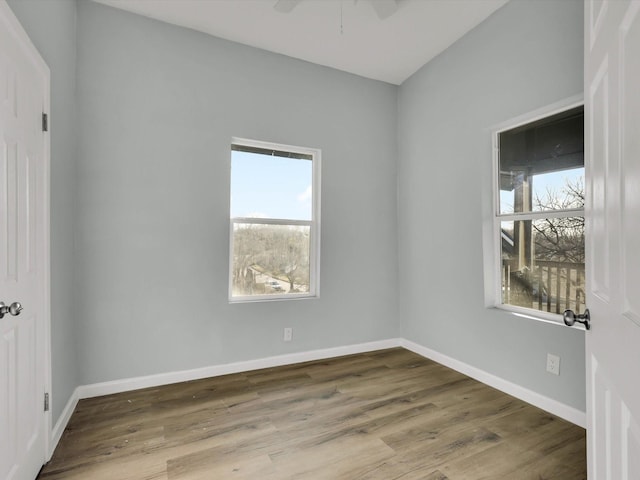 spare room featuring ceiling fan and light hardwood / wood-style floors