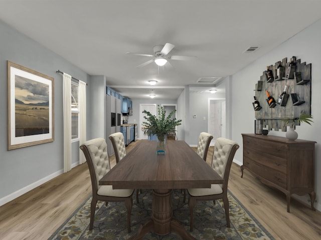 dining room featuring light hardwood / wood-style flooring