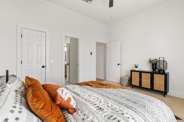 bedroom with baseboards, ornamental molding, a high ceiling, light colored carpet, and ceiling fan