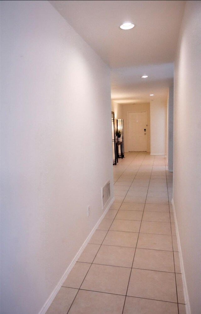 bathroom featuring tile patterned floors, toilet, and vanity