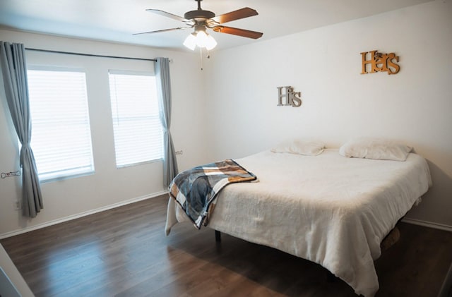 bedroom with ceiling fan and dark hardwood / wood-style flooring