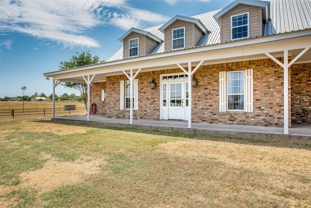 view of front of property featuring a front lawn