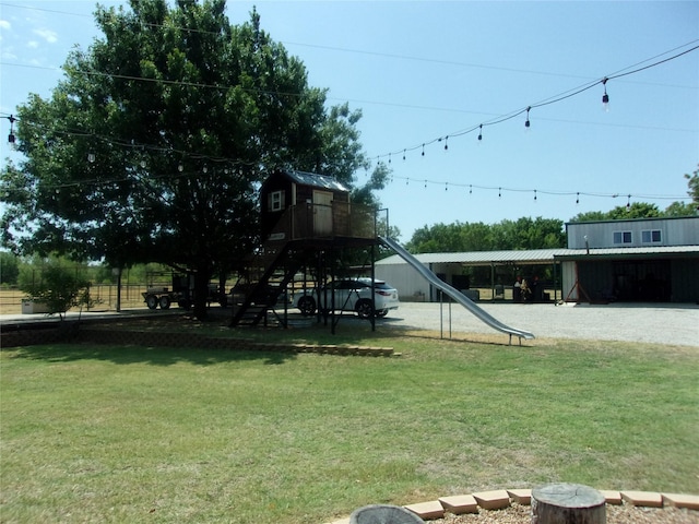 view of yard with a carport