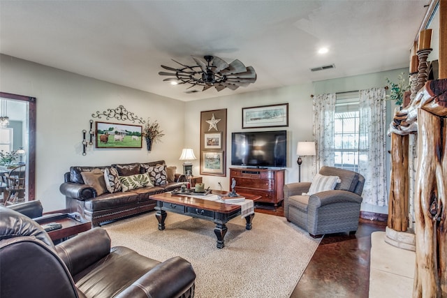 living room with ceiling fan