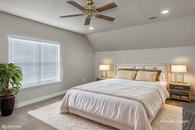 bedroom with lofted ceiling and ceiling fan