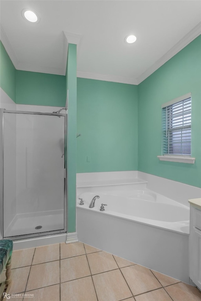 bathroom with crown molding, tile patterned floors, and vanity