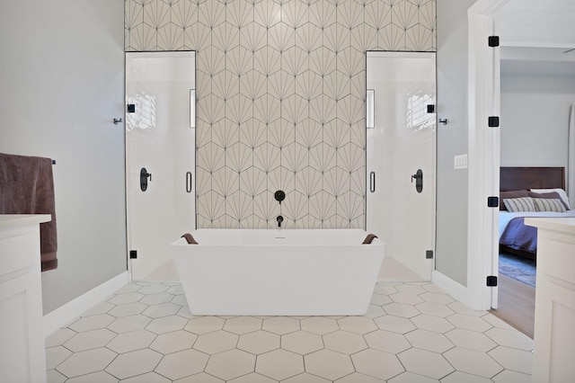 bathroom featuring tile walls, tile patterned flooring, and independent shower and bath