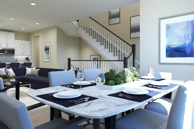 dining room with light hardwood / wood-style flooring