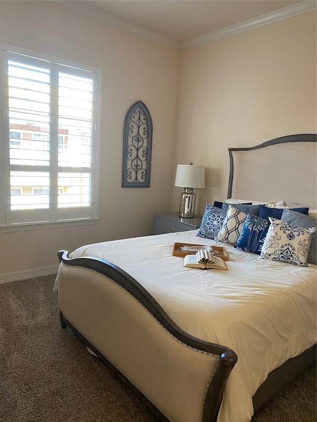 bedroom featuring dark carpet and ornamental molding