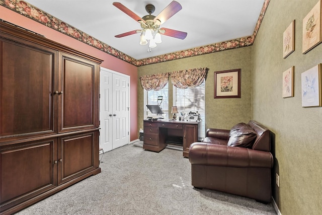 sitting room with light carpet and ceiling fan