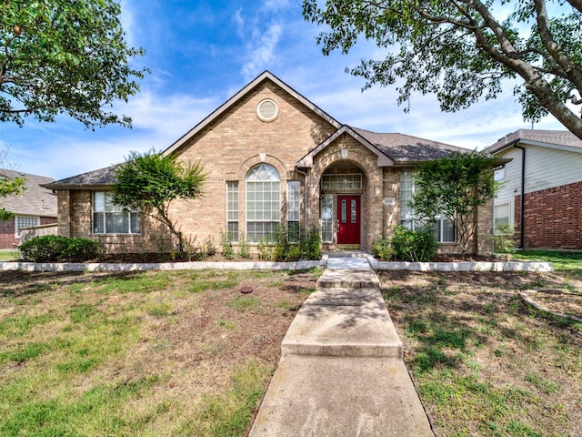 view of front of home with a front yard