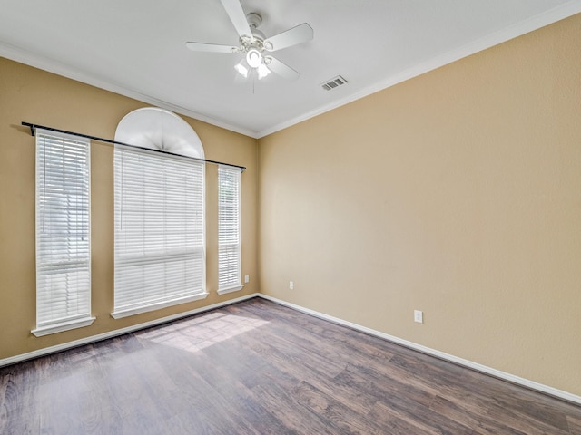 unfurnished room featuring crown molding, wood-type flooring, and ceiling fan