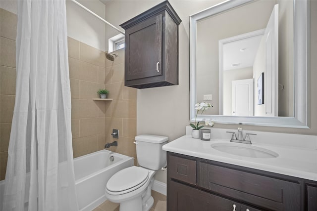 full bathroom featuring vanity, shower / bath combination with curtain, and toilet