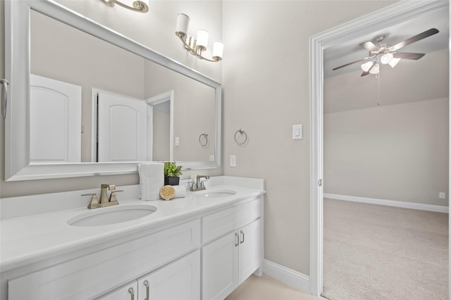 bathroom with vanity and ceiling fan