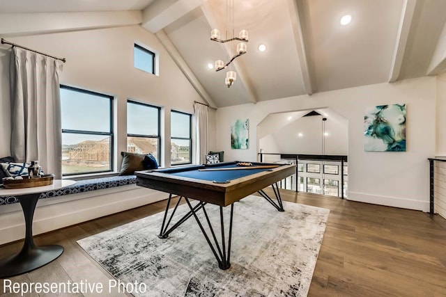 rec room with beamed ceiling, wood finished floors, baseboards, and high vaulted ceiling