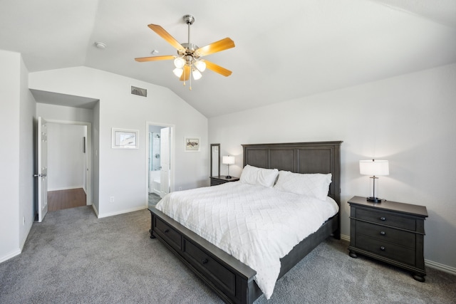 carpeted bedroom featuring ceiling fan, ensuite bathroom, and vaulted ceiling