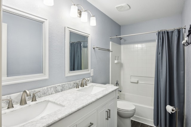 full bathroom with vanity, hardwood / wood-style floors, shower / bath combination with curtain, and toilet