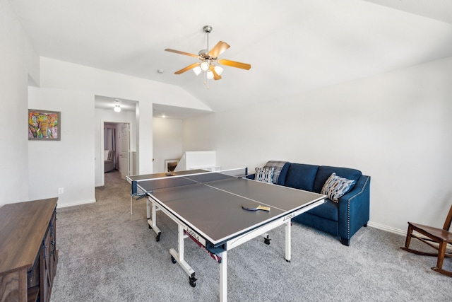 rec room with lofted ceiling, light carpet, and ceiling fan