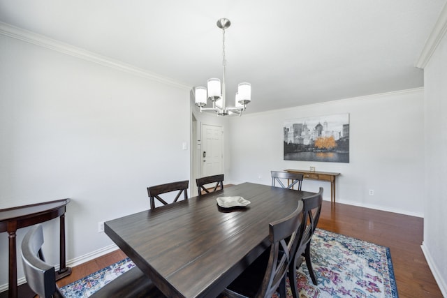 dining space featuring crown molding and dark hardwood / wood-style flooring