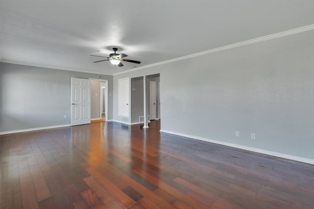 spare room featuring crown molding, dark hardwood / wood-style floors, and ceiling fan