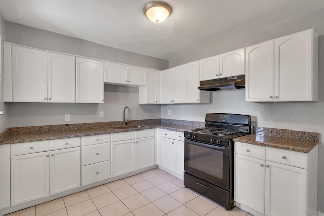 kitchen with black gas range, sink, and white cabinetry