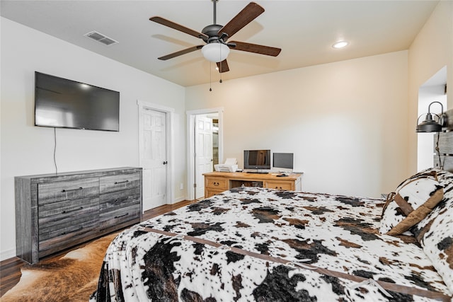 bedroom featuring dark wood-type flooring and ceiling fan