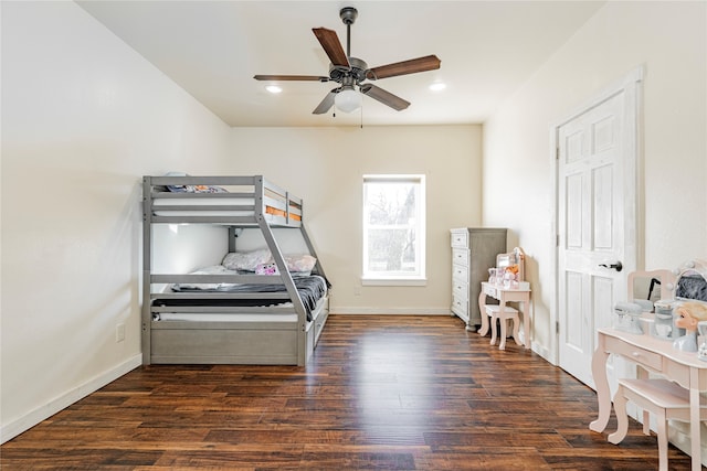 bedroom with dark wood-type flooring and ceiling fan