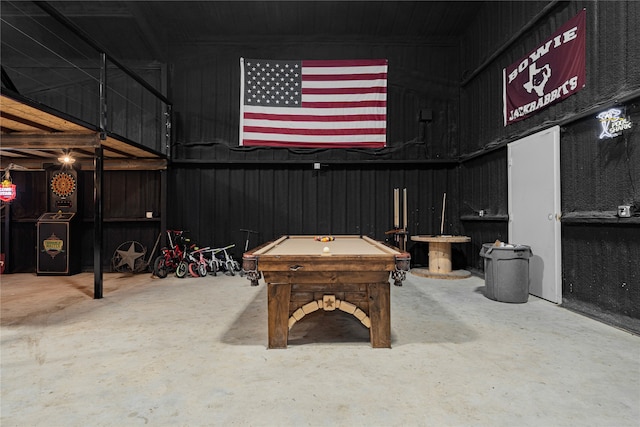 rec room with pool table and concrete floors