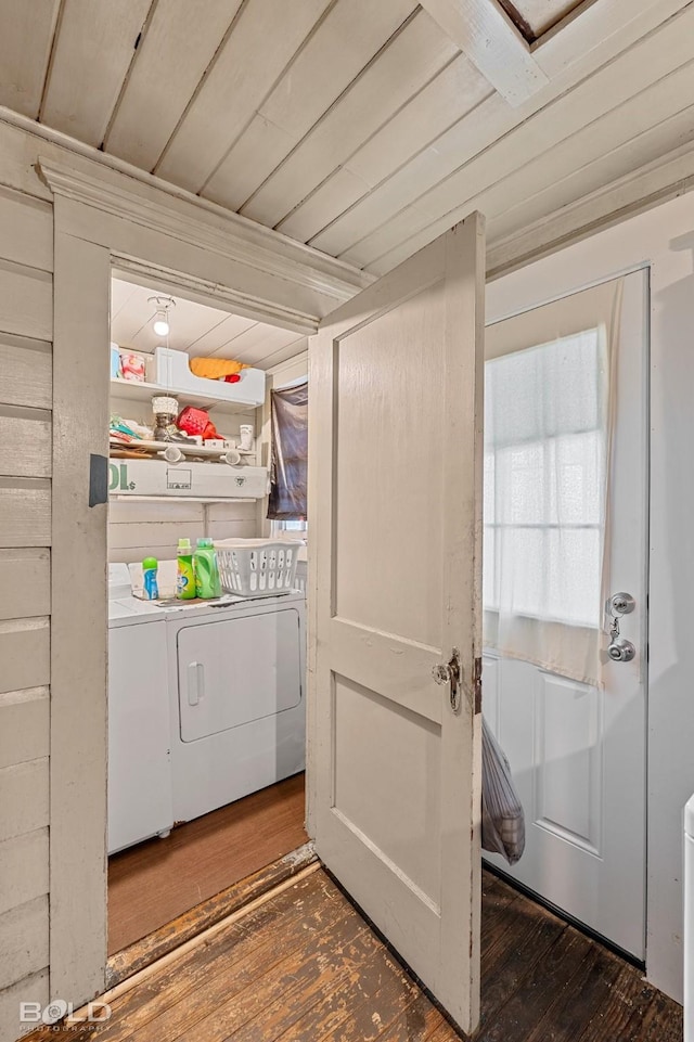 laundry area with washer and dryer, wood ceiling, and dark hardwood / wood-style flooring