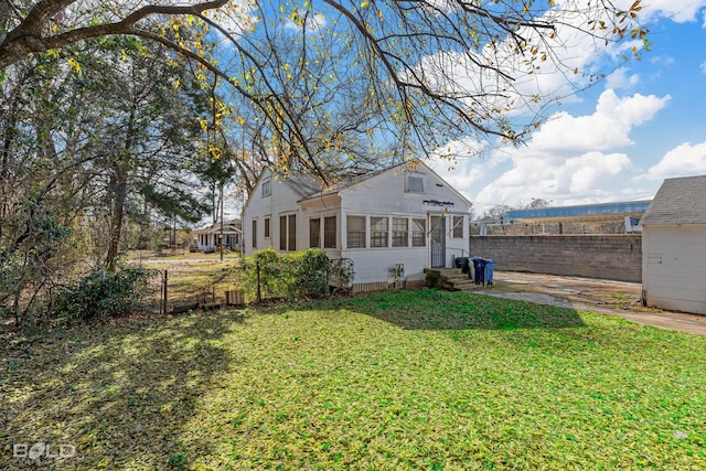 exterior space with a lawn