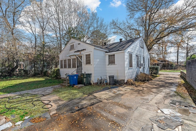 exterior space with a yard