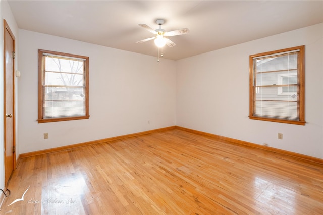 empty room featuring light hardwood / wood-style floors and ceiling fan