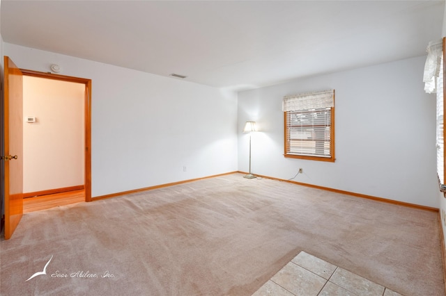 view of carpeted spare room