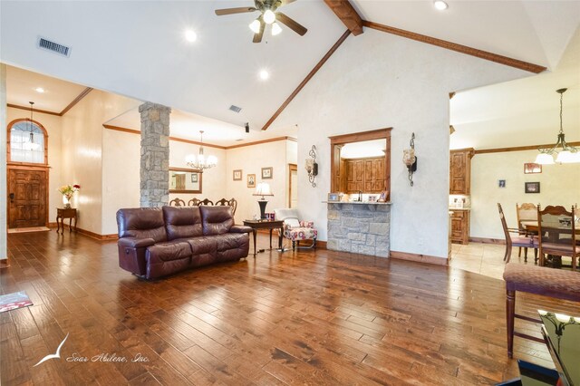 living room featuring high vaulted ceiling, wood-type flooring, decorative columns, and beamed ceiling