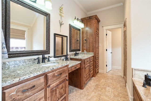 bathroom featuring crown molding and vanity