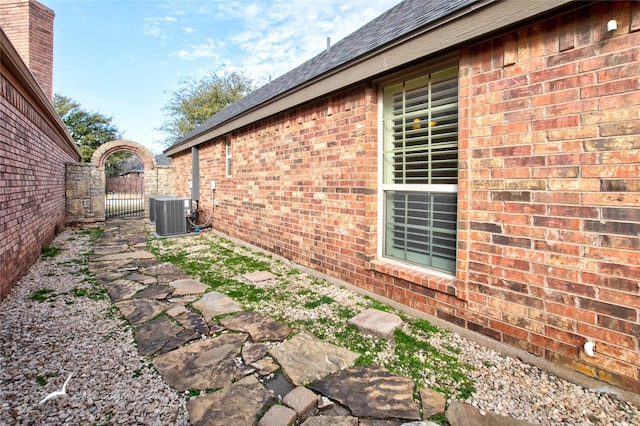 view of property exterior with cooling unit