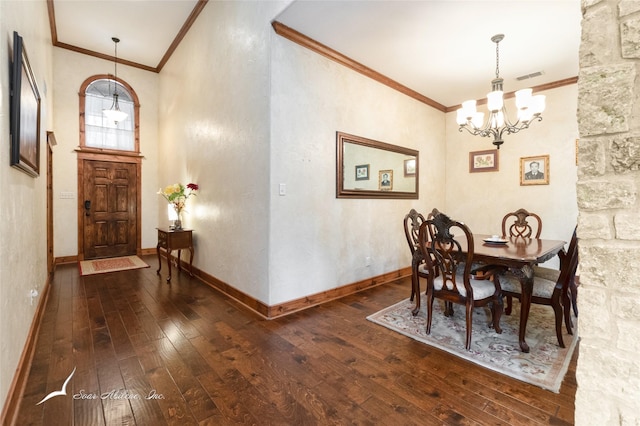 dining room with ornamental molding, a notable chandelier, and dark hardwood / wood-style flooring