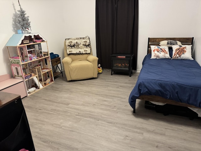 bedroom with wood-type flooring