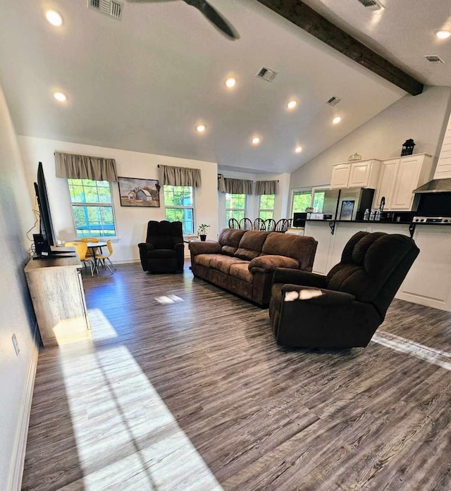 living room featuring wood-type flooring and lofted ceiling with beams