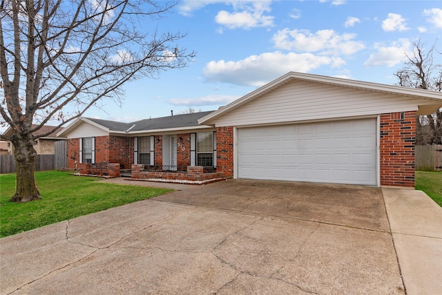 single story home featuring a garage and a front lawn