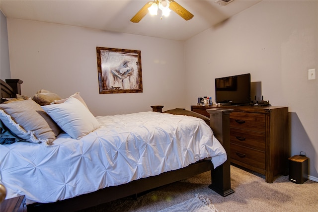 bedroom featuring ceiling fan and light colored carpet