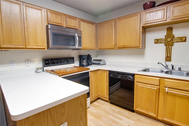 kitchen with sink, light hardwood / wood-style floors, black dishwasher, and white range with electric cooktop