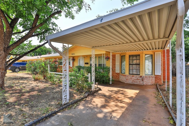 view of patio featuring a carport