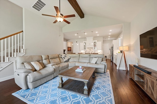 living room featuring beamed ceiling, ceiling fan, dark hardwood / wood-style floors, and high vaulted ceiling