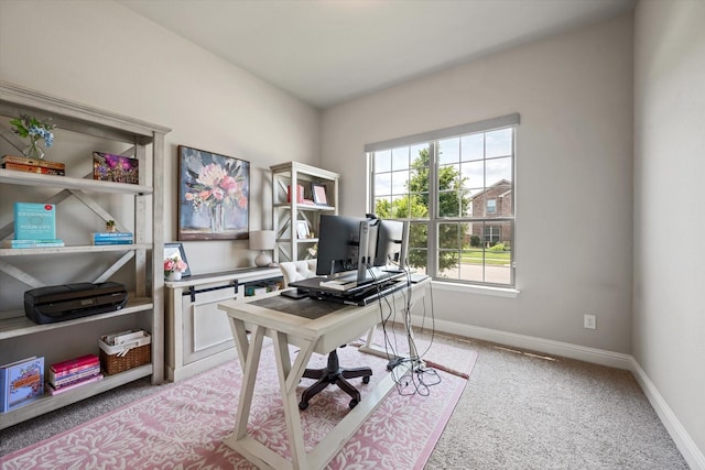 home office with light colored carpet