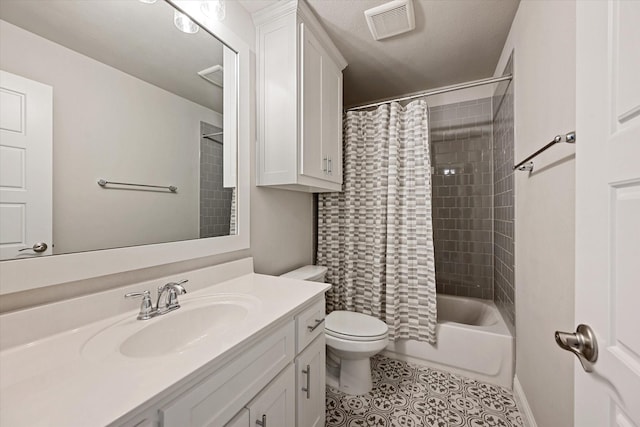 full bathroom with tile patterned flooring, vanity, shower / tub combo with curtain, and toilet